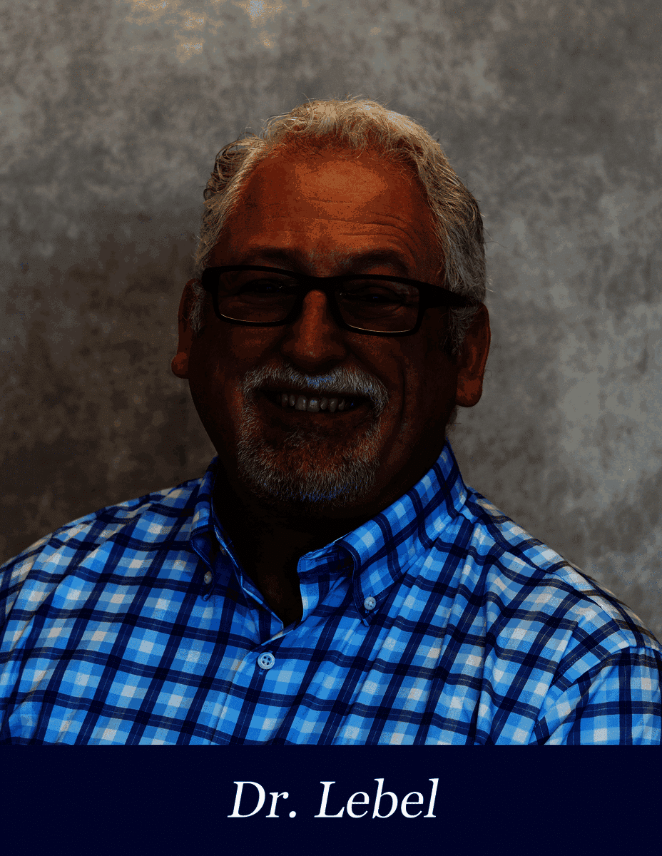 Dr. Lebel smiling in a blue plaid shirt, reflecting Clemson's commitment to helping answer questions Monday through Thursday.