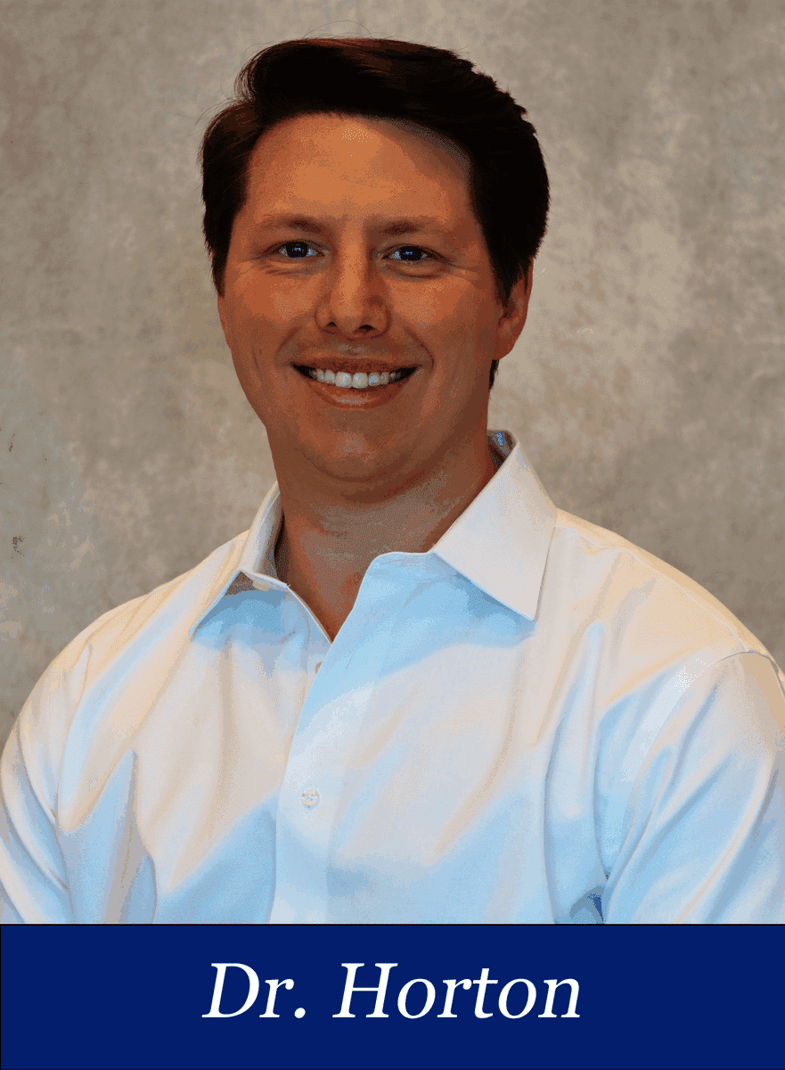 Dr. Horton smiling in a white shirt, available to help answer questions Monday through Thursday at Clemson.