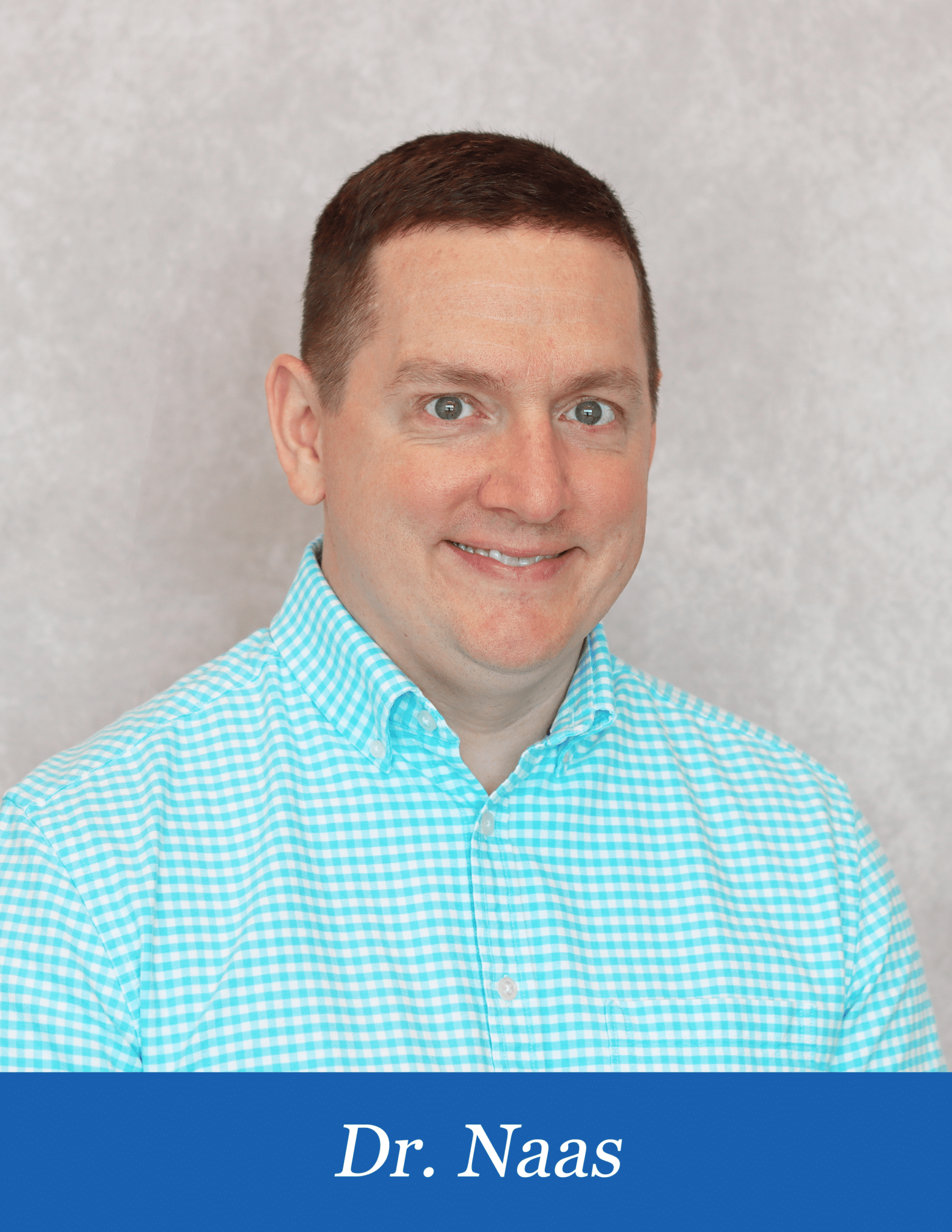 Dr. Naas in a checkered shirt, representing the friendly service at Spartanburg Endoscopy Center.